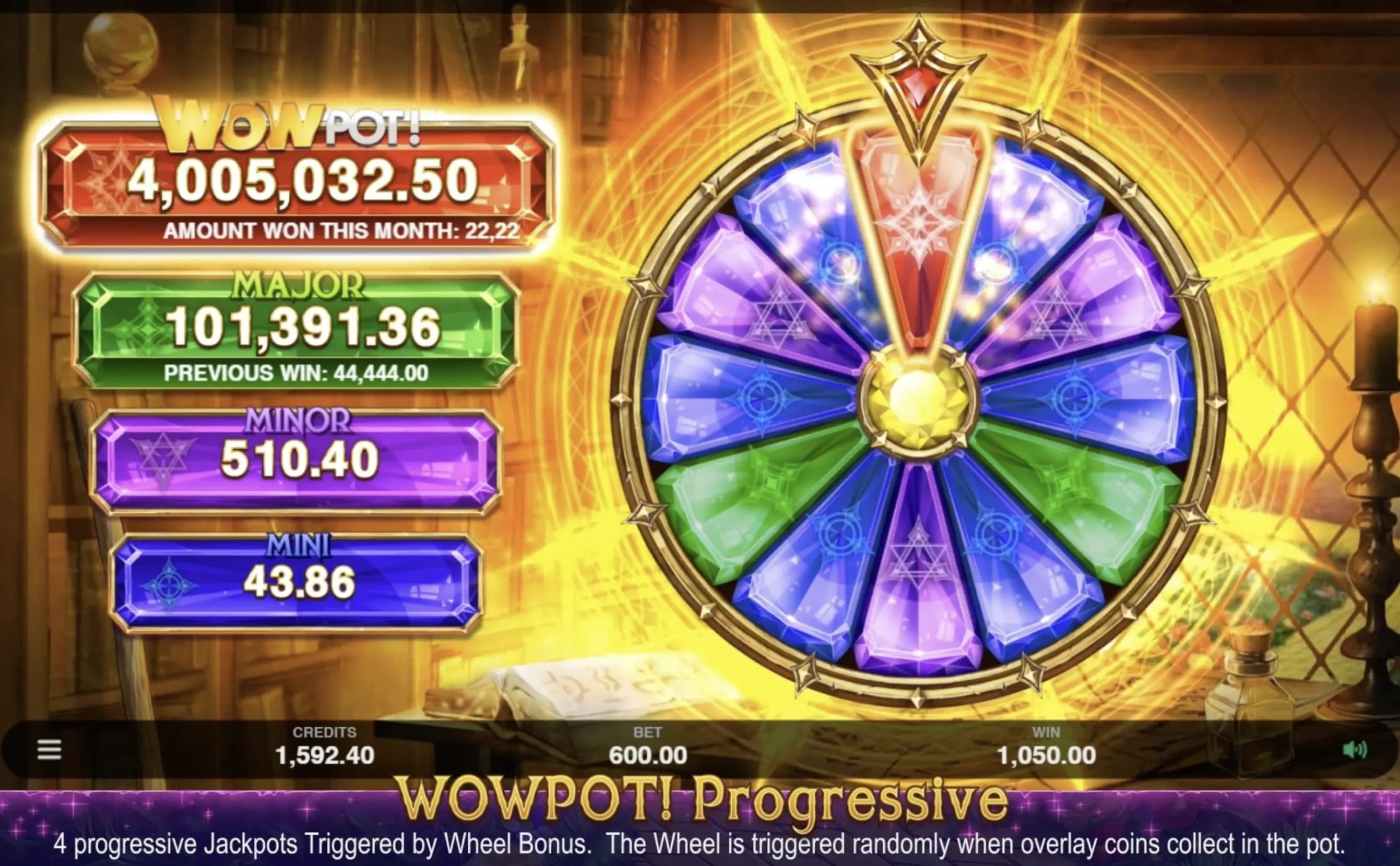 WOWPOT progressive jackpot wheel showing multiple prize tiers and bonus feature